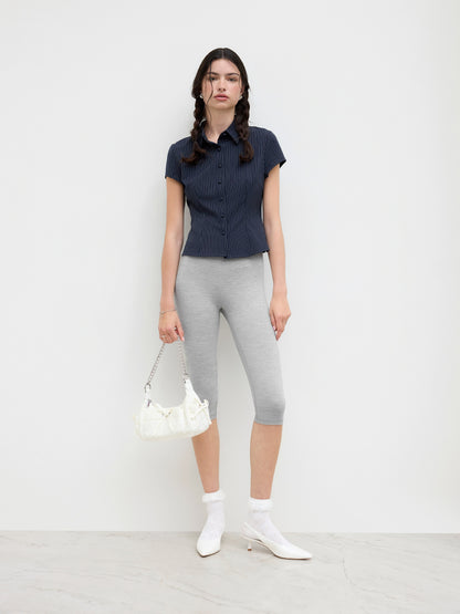Camicia a maniche corte con righe sul colletto